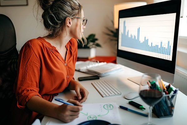 Woman on desktop computer